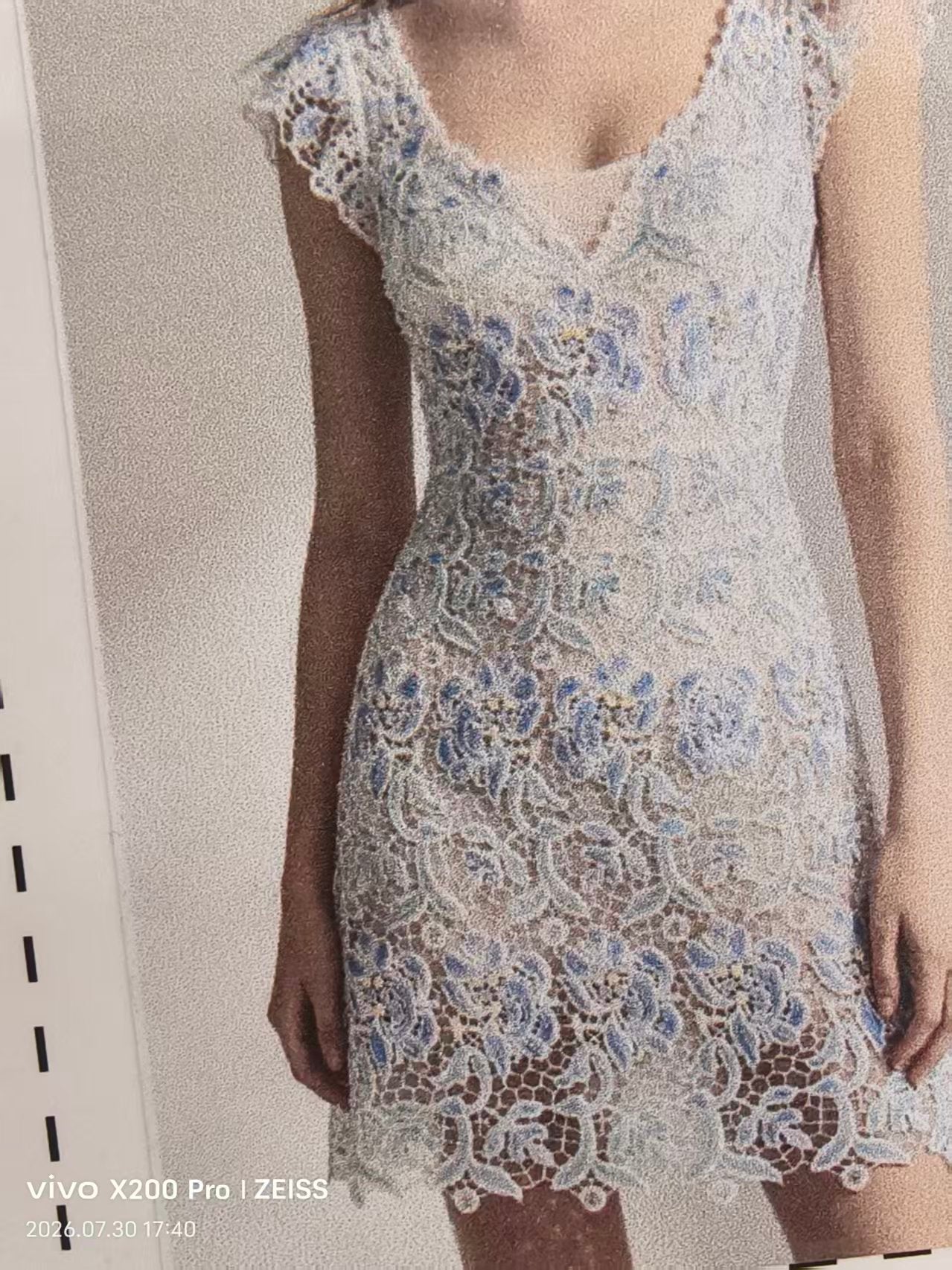 Silver-Blue Holographic Lace Fabric draped as a dress